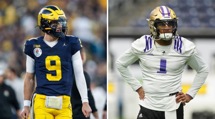 J.J. McCarthy stands looking to the side; Michael Penix Jr. Stands with his hands on his hips